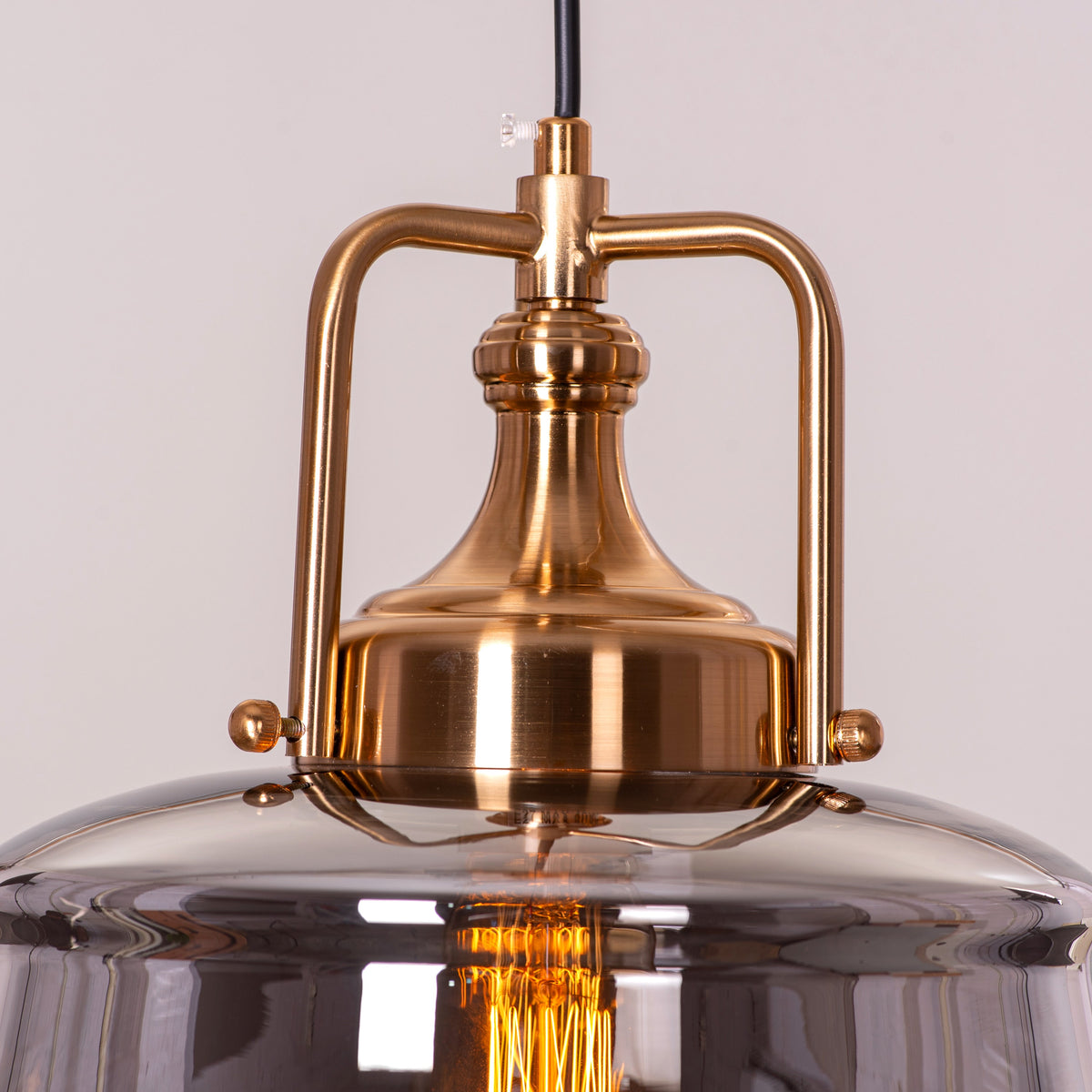 Eyes Closed (Gold, Smokey Grey) Clear Glass Pendant Light